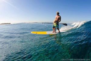 Robby Naish sharing the stroke with his daughter - family fun is a solid part of SUP Perspective