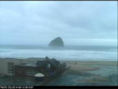 Live web cam February 12, 2014 looking across the cozy Pelican Pub to iconic haystack rock