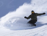 Laird catching a glide on a frozen 